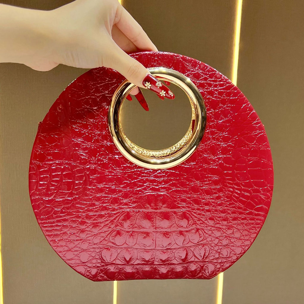 Borsa Tonda con Manico Oro