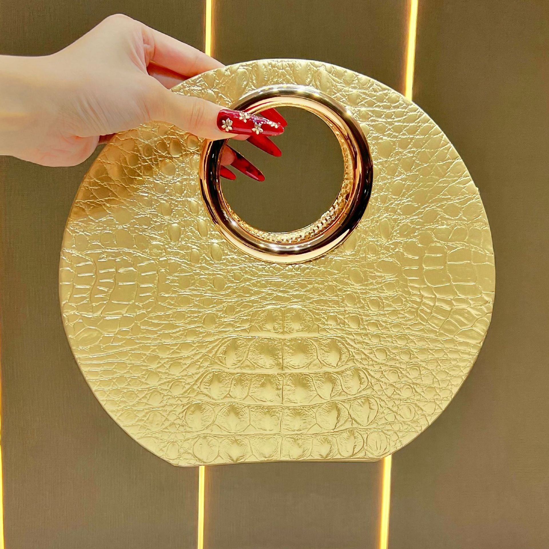 Borsa Tonda con Manico Oro
